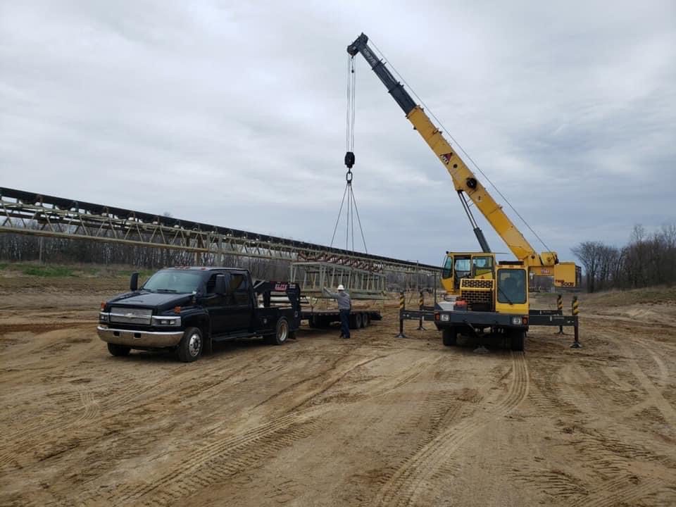 Hydraulic crane in the construction site